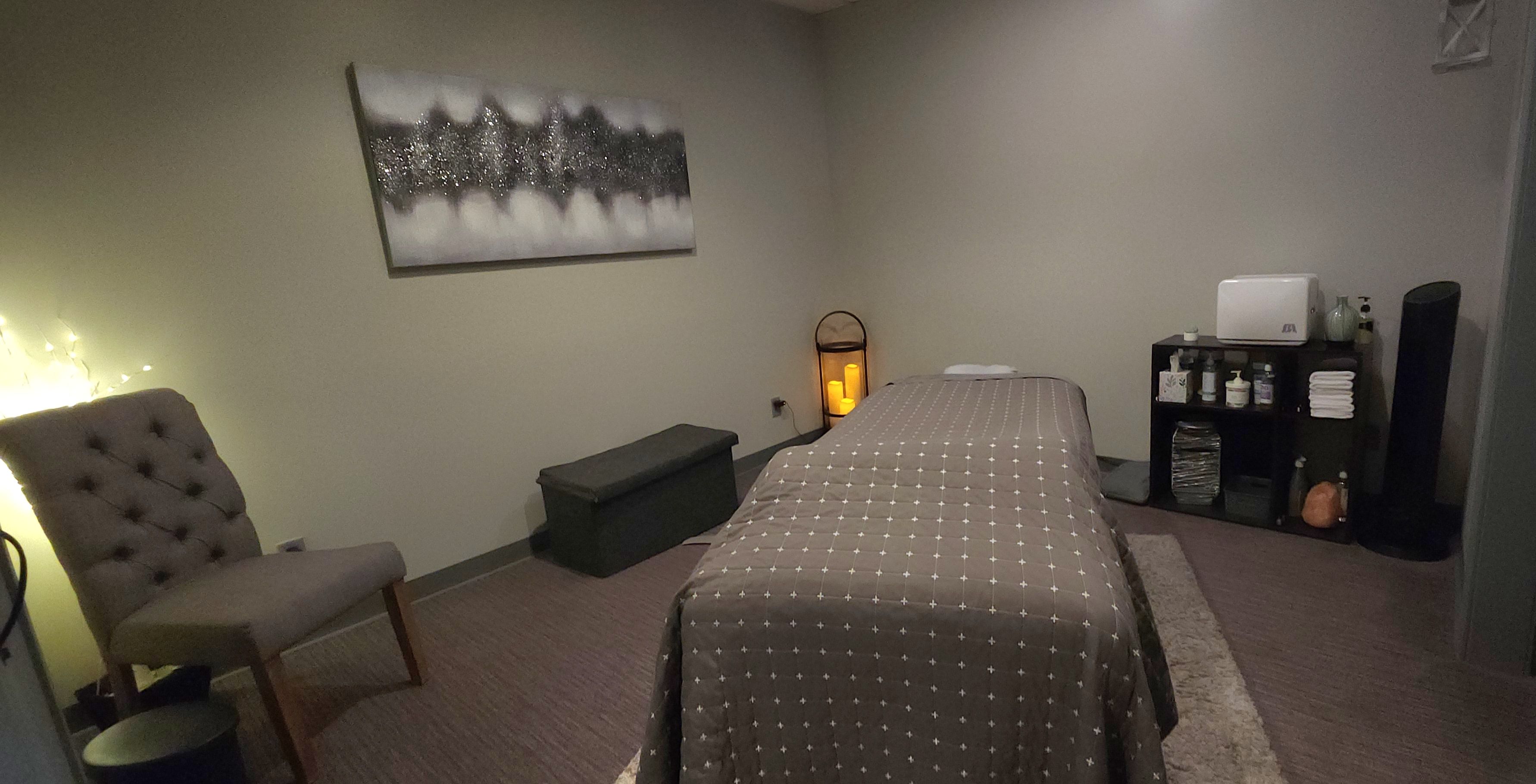 A warm, candle-lit treatment room at Majestic Spa & Salon in Ringgold, GA
